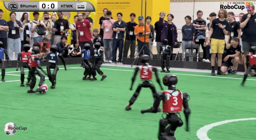 Robocup 11 vs. 11 soccer match